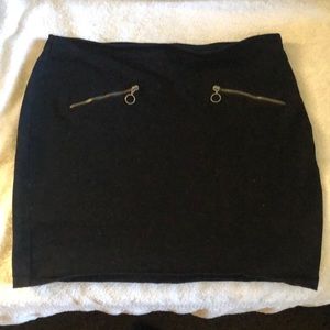 Black form fitting side zipper skirt